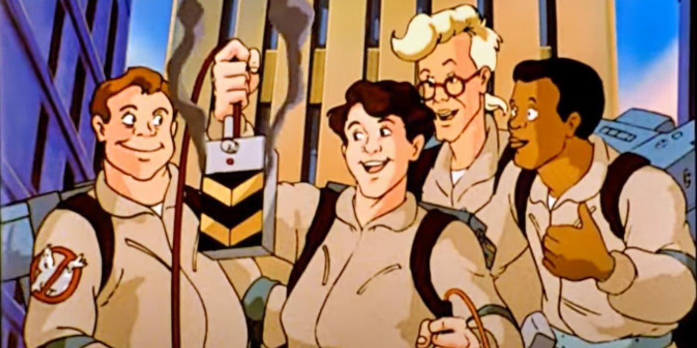 the real ghostbusters gang gather around a ghost trap in the animated series