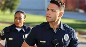 Carlos Reyes walking and turning to his right in 9-1-1 Lone Star