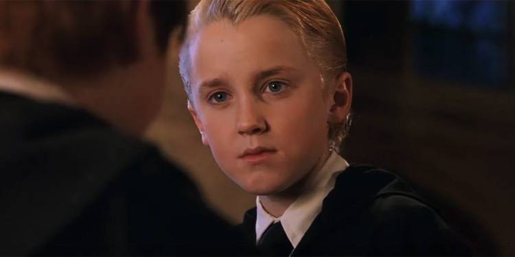 Draco-Malfoy-glares-at-Ron-Weasley-in-Harry-Potter-and-the-Sorcerers-Stone How Old The Harry Potter Cast Was Compared To Their Characters