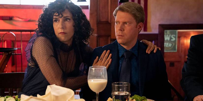 Judy Gemstone hugging her husband BJ in The Righteous Gemstones.