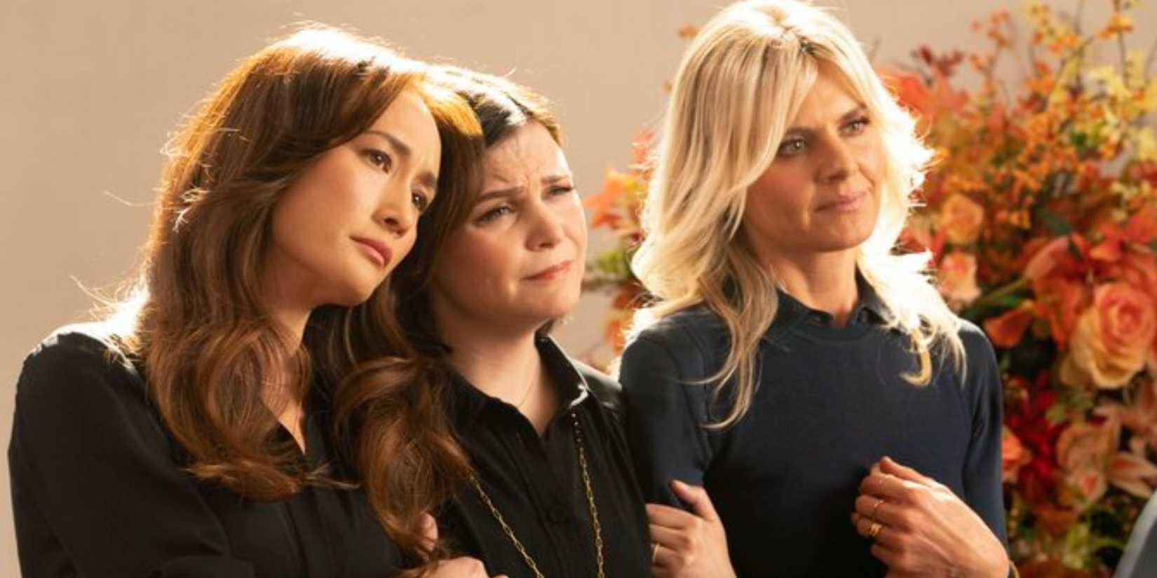 Sarah, Jodie, and Amy at a funeral on Pivoting