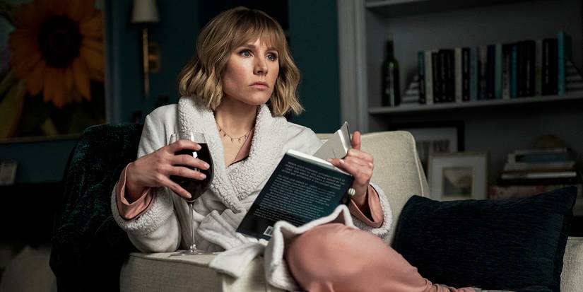 Anna (Kristen Bell) in her living room on the woman in the house in front of the girl at the window
