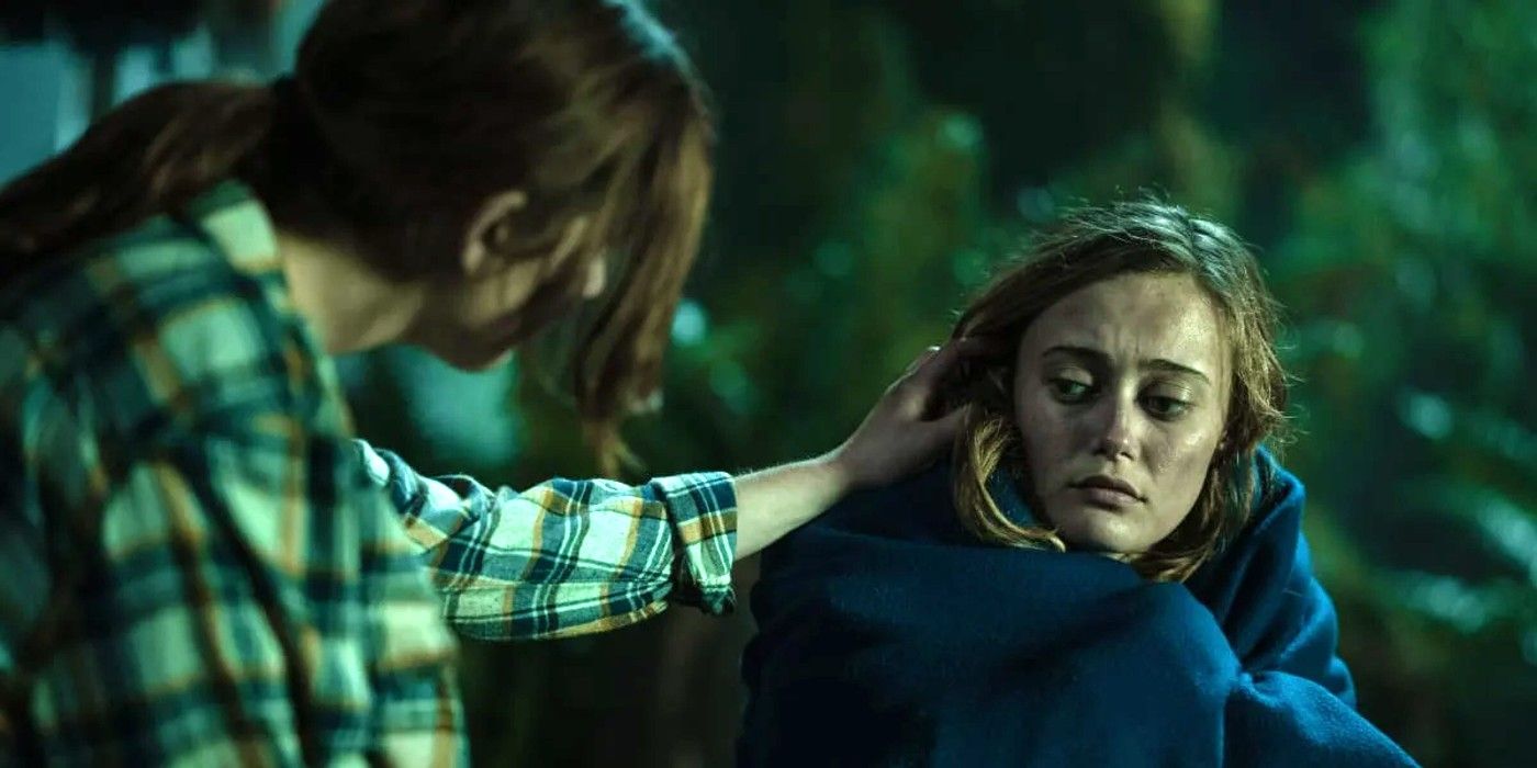 Shauna (Sophie Nélisse) reaching out to Jackie (Ella Purnell) in Yellowjackets season 2 episode 2.