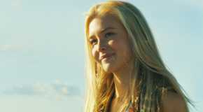 Elsa Dutton smiling in the 1883 finale.