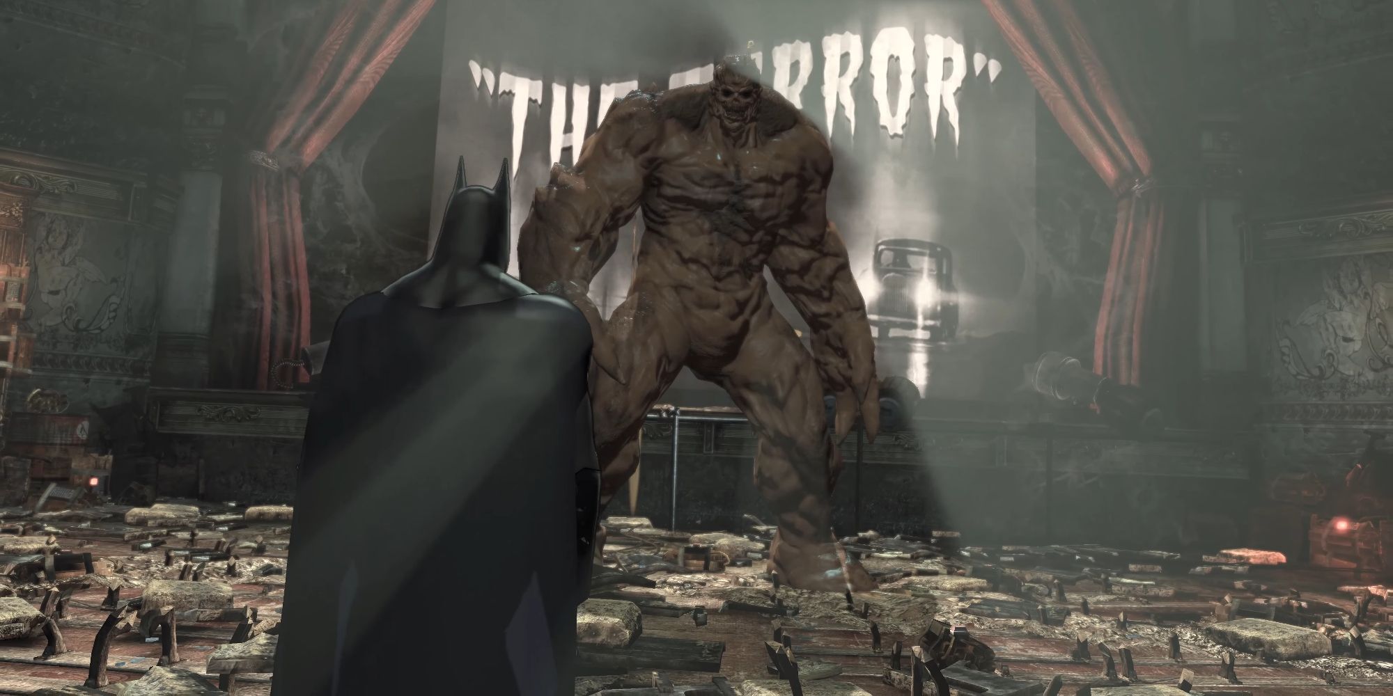 Batman confronting Clayface in the theater in Batman Arkham City