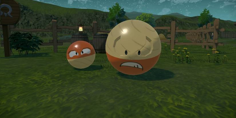 Voltorb and Electrode's Hisuian Forms in a ranch in Pokémon Legends: Arceus.