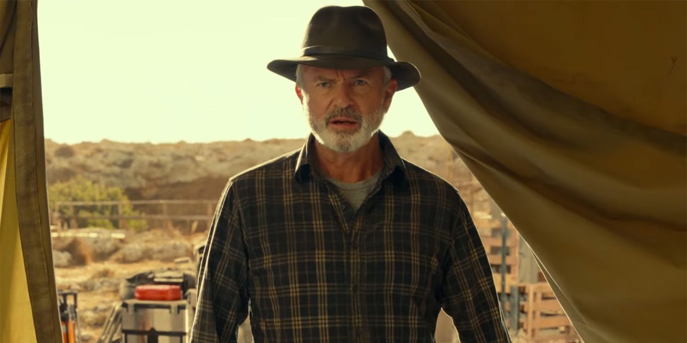 Sam Neill looking shocked in a tent in Jurassic World Dominion