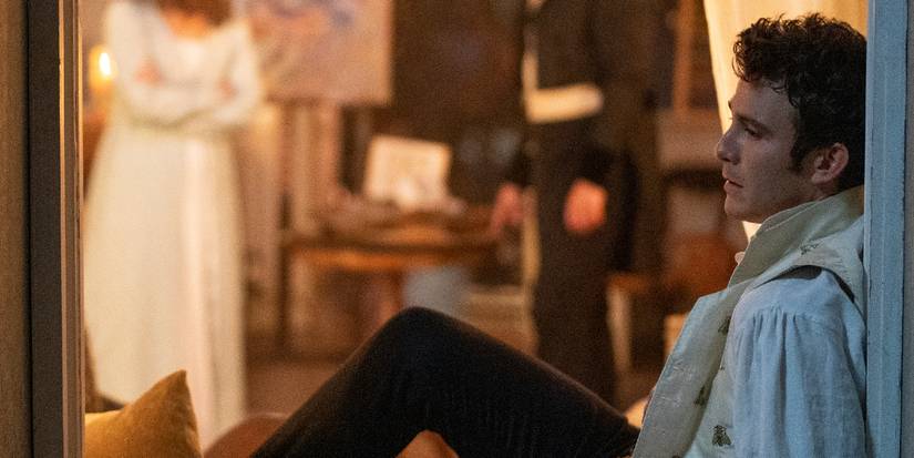 Benedict Bridgerton sitting in a window in Bridgerton Season 2