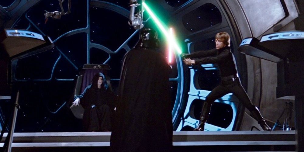 Darth Vader and Luke Skywalker battle with lightsabers in Star Wars Episode VI Return Of The Jedi Cropped