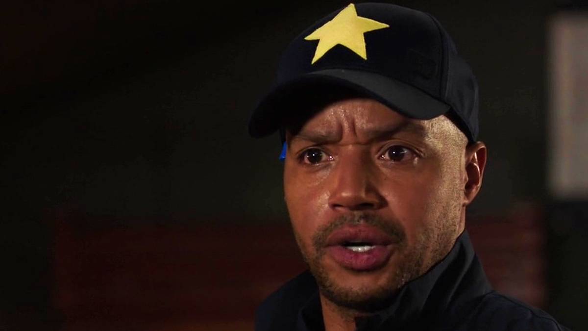 The Flash Showrunner Explains Booster Gold Easter Egg