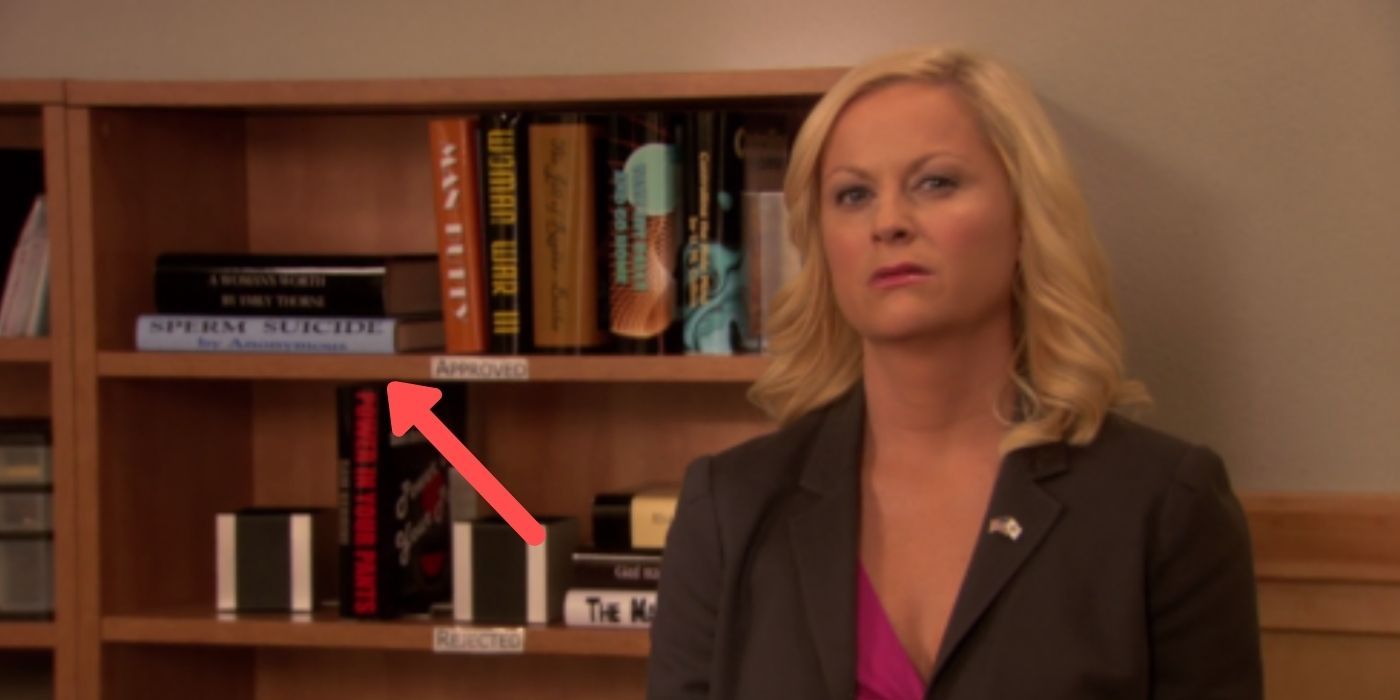 Leslie Knope in front of Tammy IIs book shelf on Parks and Rec