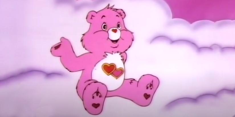 Loves A Lot Bear sitting on purple clouds