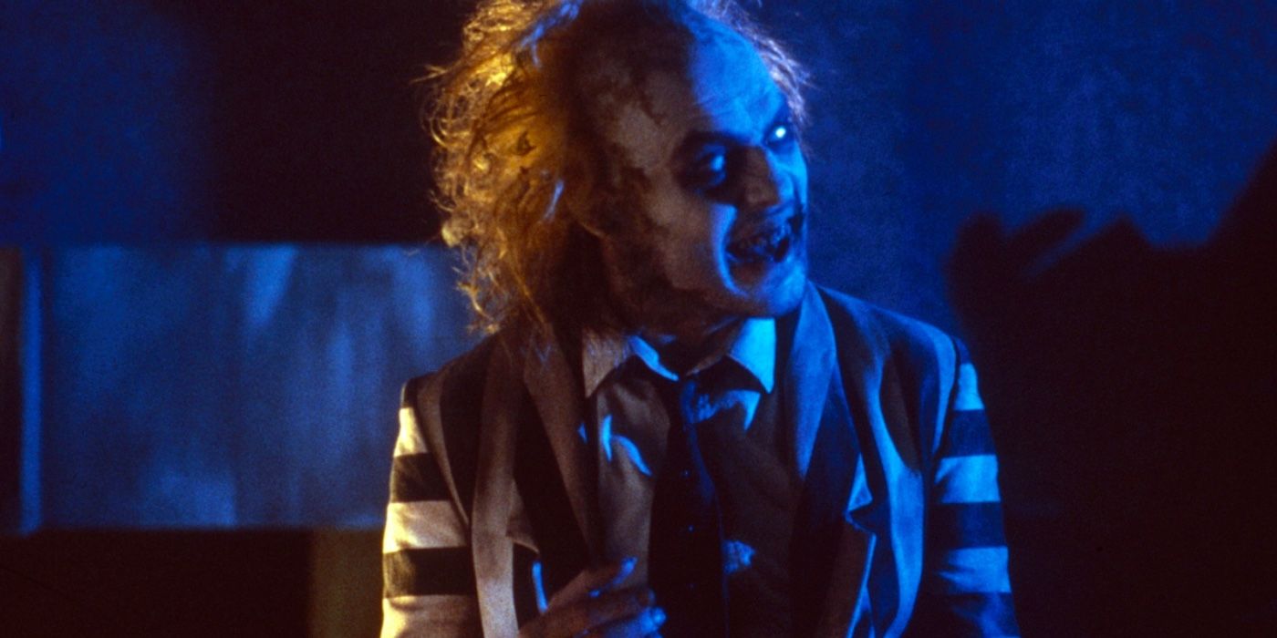 Michael Keaton grinning in Beetlejuice.