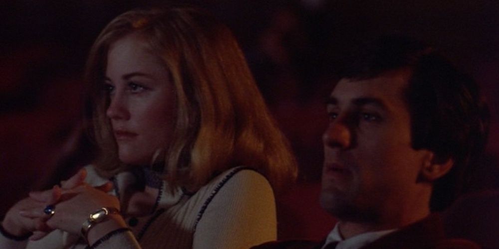 Robert De Niro and Cybill Shephard watch a movie in Taxi Driver Cropped 2 1