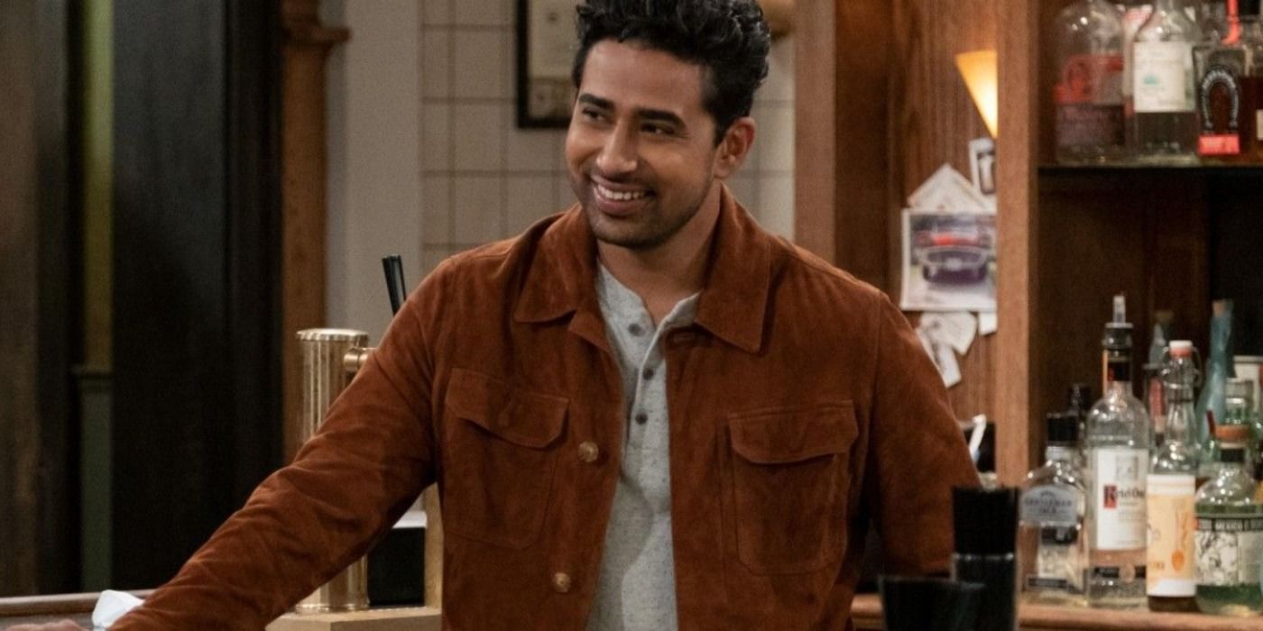 Sid laughs while working at the bar in How I Met Your Father Cropped 1