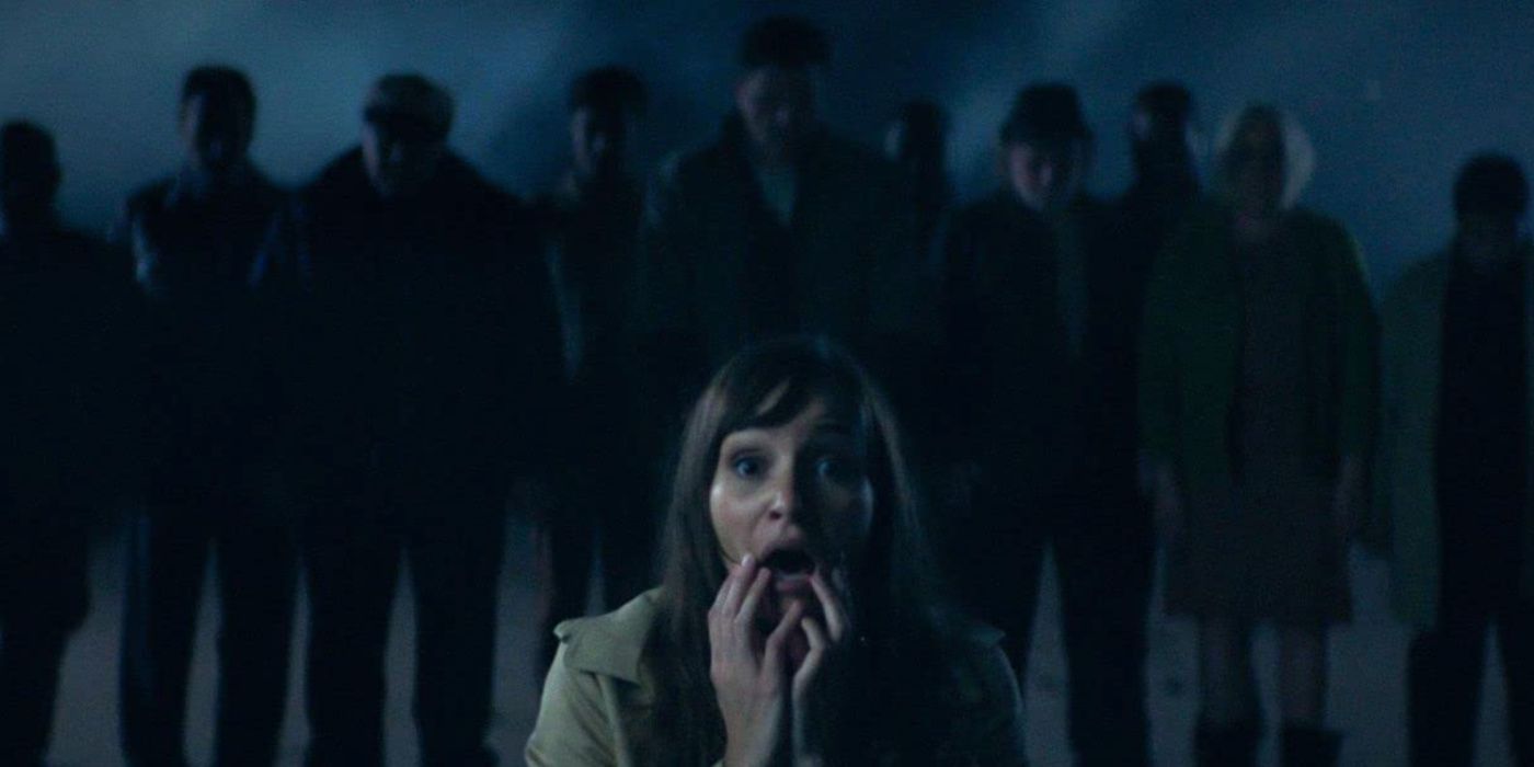 The Offseason movie promotional image of Marie in front of a line of zombies