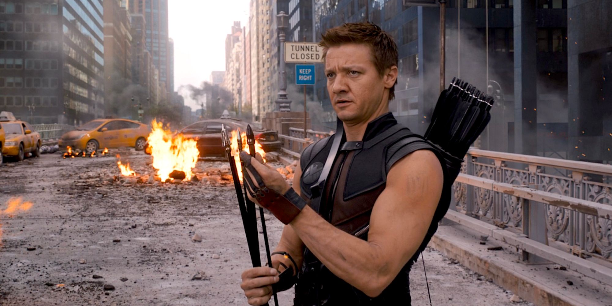 Jeremy Renner as Hawkeye preparing an arrow during the Battle of New York in 2012's The Avengers