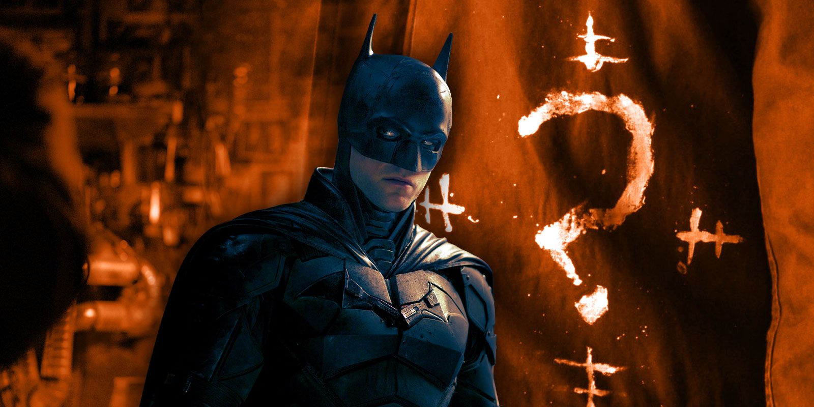 O Batman de Pattinson com um dos pontos de interrogação desenhados à mão por Riddler.