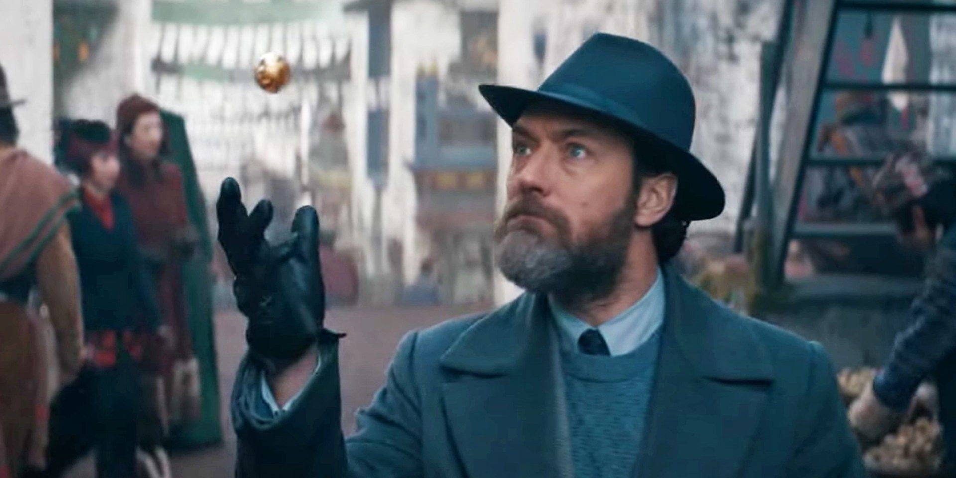 Albus Dumbledore with the Golden Snitch in Fantastic Beasts 3 Cropped