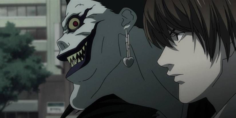 10 Anime That Are 10/10 If You Ignore Their Horrible Endings 4 The shinigami Ryuk standing with Light Yagami in Death Note