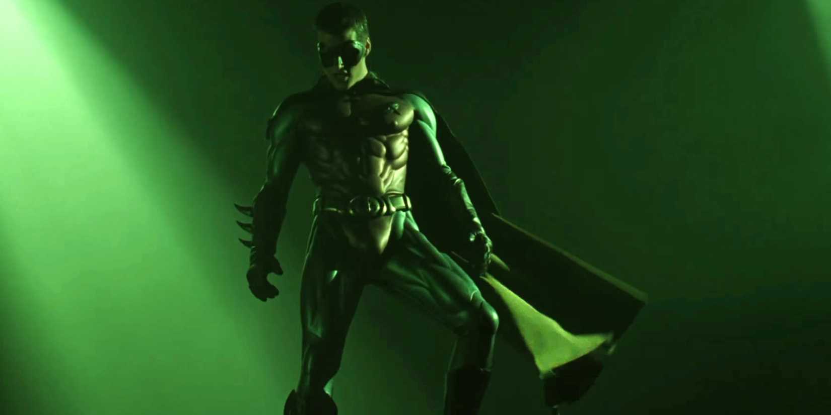 Dick Grayson AKA Robin standing over Two-Face in Batman Forever