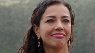 Jasmine Pineda in 90 Day Fiance close-up of face smiling in the rain