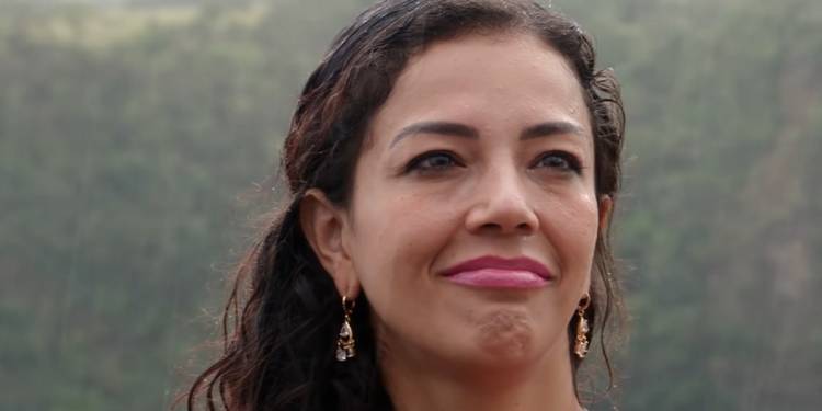 Jasmine Pineda in 90 Day Fiance close-up of face smiling in the rain