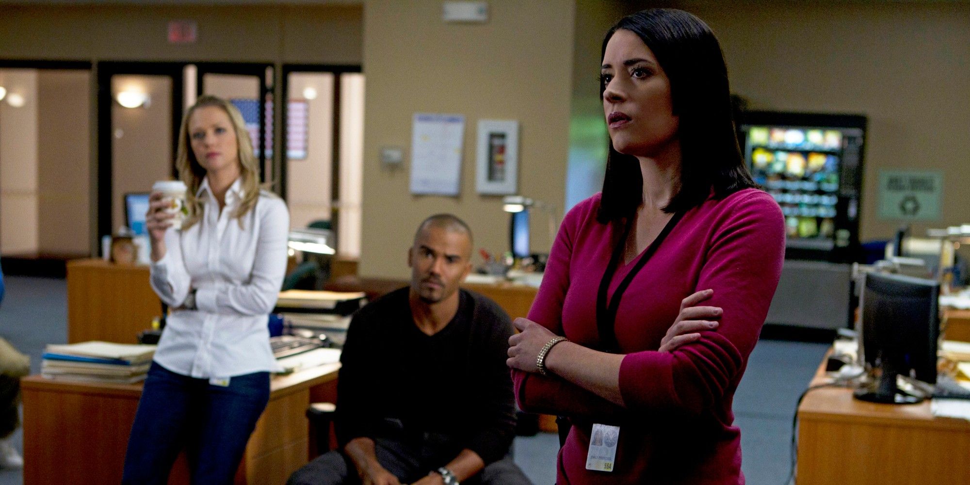 JJ Emily and Morgan standing and discussing a case in Criminal Minds