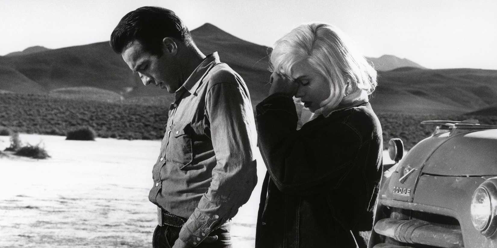 Marilyn Monroe and Montgomery Clift looking downcast in The Misfits