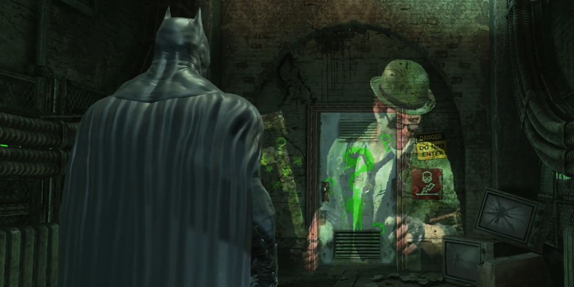 Riddler appearing as a projection before Batman in Batman Arkham City