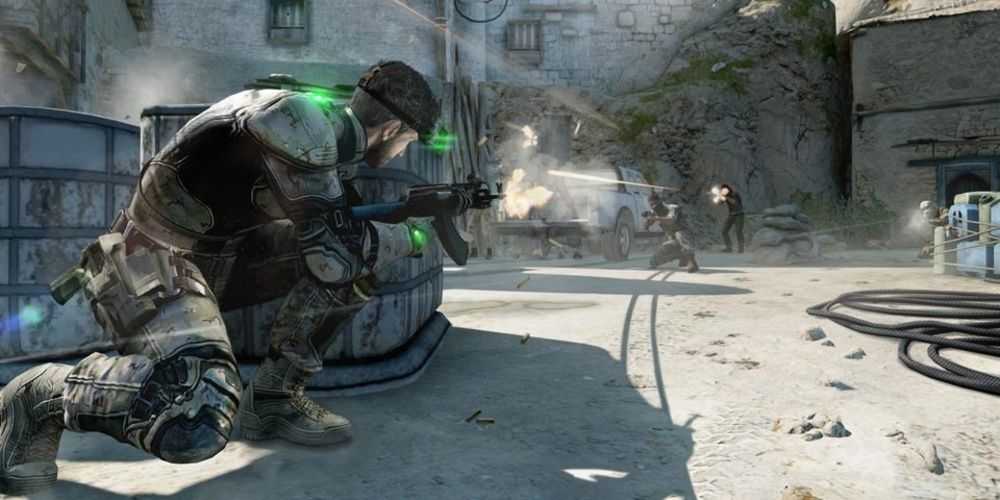 Sam Fisher shooting at enemies in Splinter Cell Blacklist Cropped 1