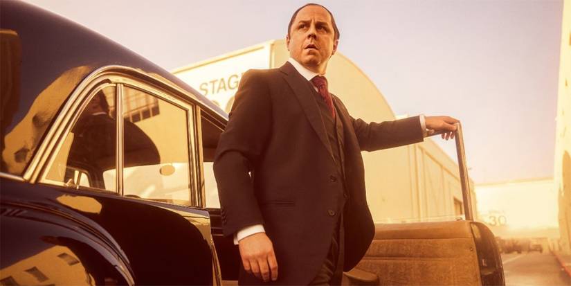 Giovanni Ribisi as Joe Colombo exiting a car in The Offer