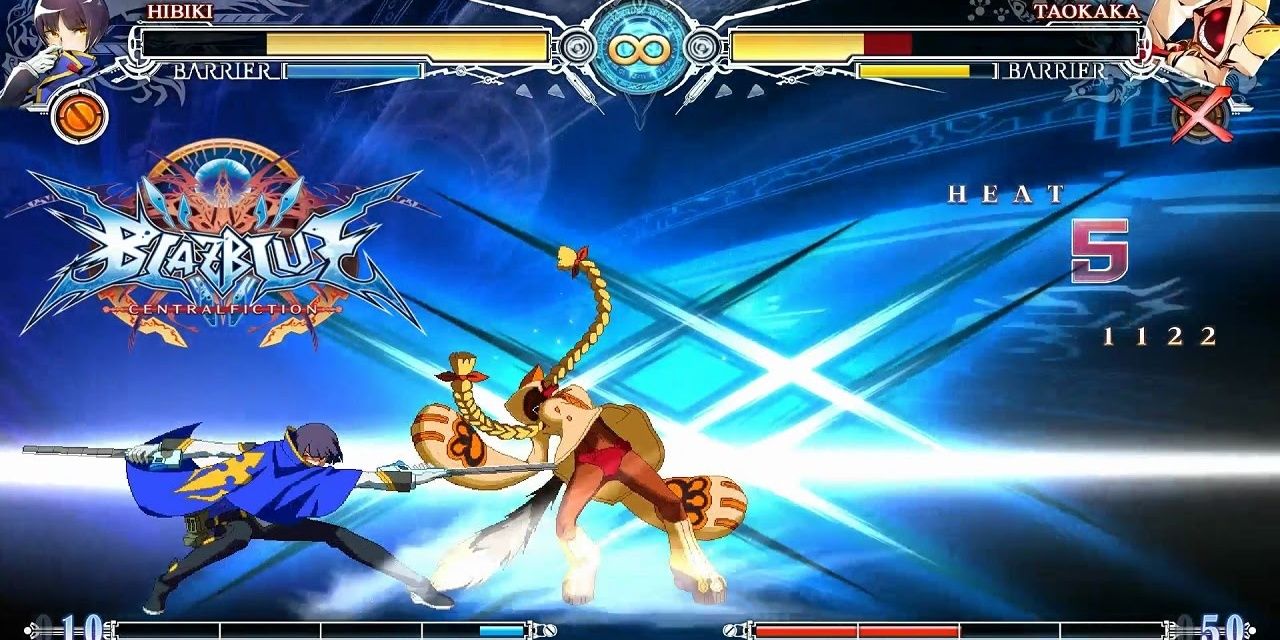 Two fighters hitting their special moves in BlazBlue Central Fiction Cropped