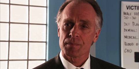 Keith Carradine as Frank Lundy looking at someone in Dexter