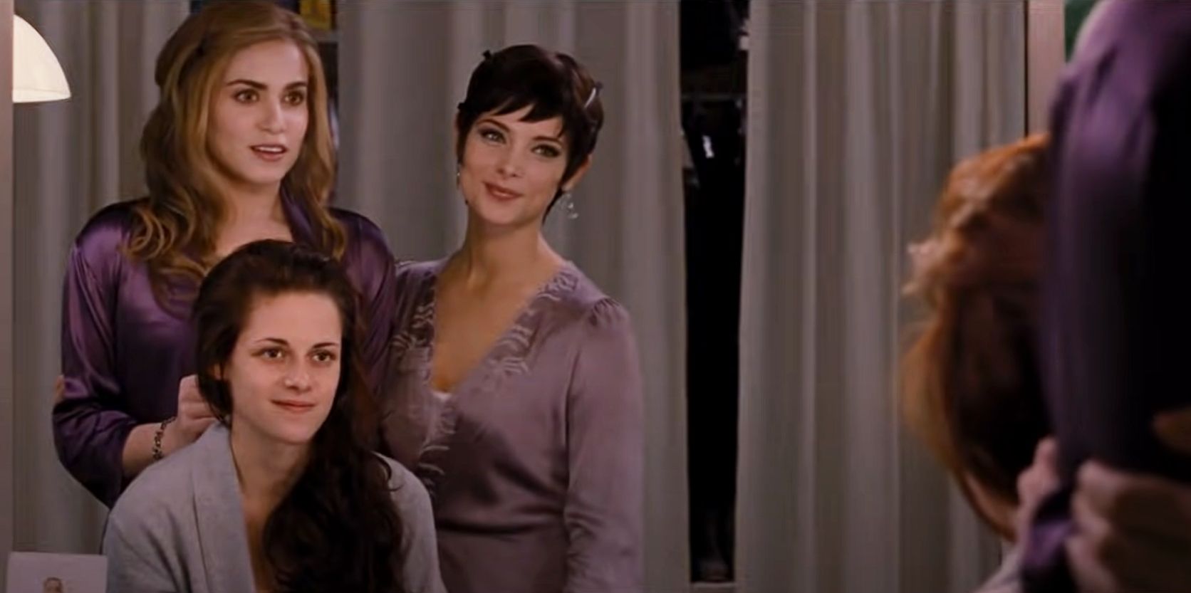 Alice and Rosalie help Bella prepare for the wedding