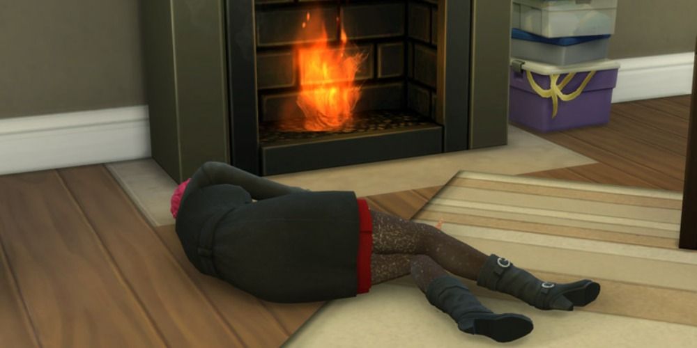 An image of a sim passed out on the floor in Sims 4