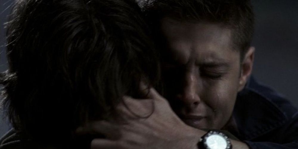 Dean hugging Sams dead body in Supernatural Cropped 1