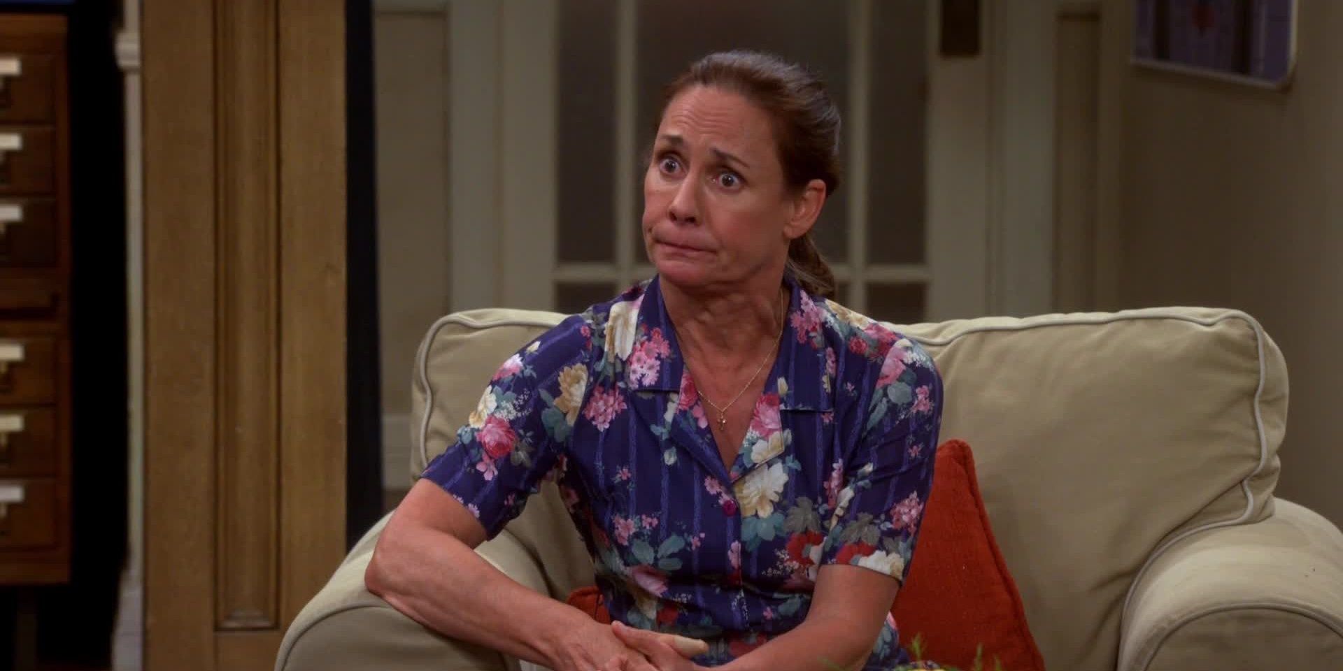 Mary Cooper complains about Sheldon while seated in an armchair in The Big Bang Theory