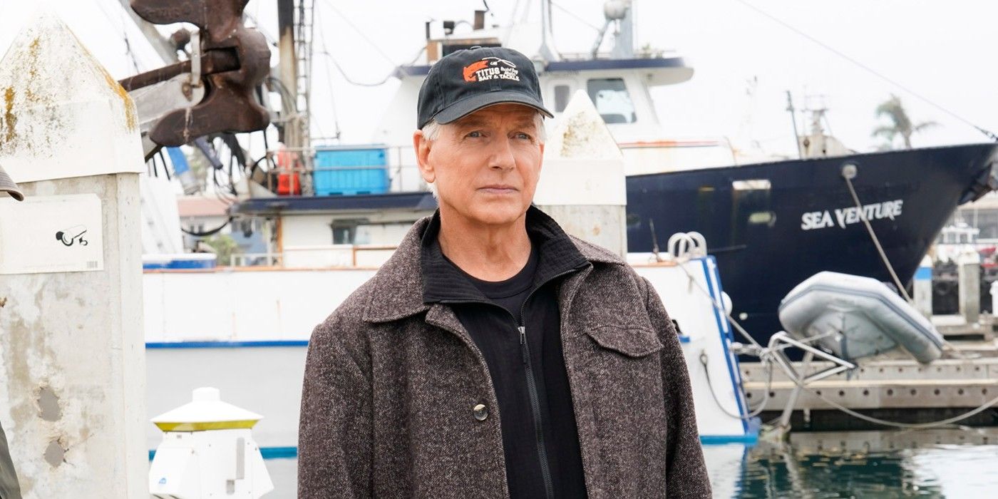 Gibbs wearing a baseball cap near the docks on NCIS 