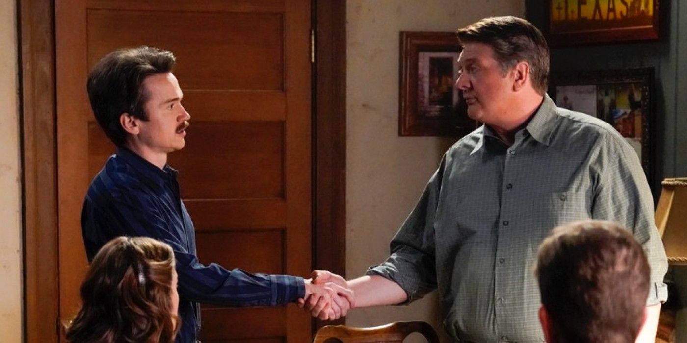 George and Rob shaking hands in Young Sheldon