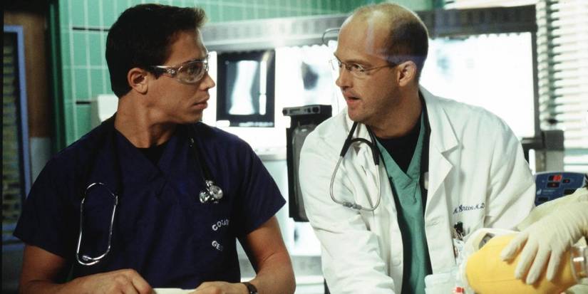 Erik Palladino and Anthony Edwards in a scene in front of x-rays in ER