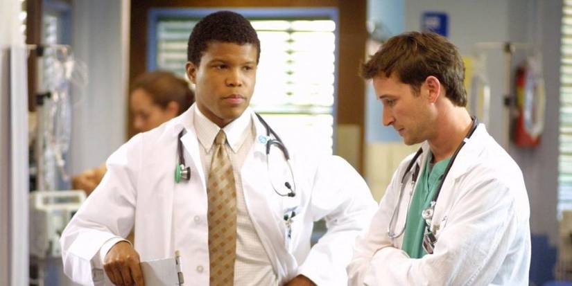 Two Doctors looking downtrodden on ER.