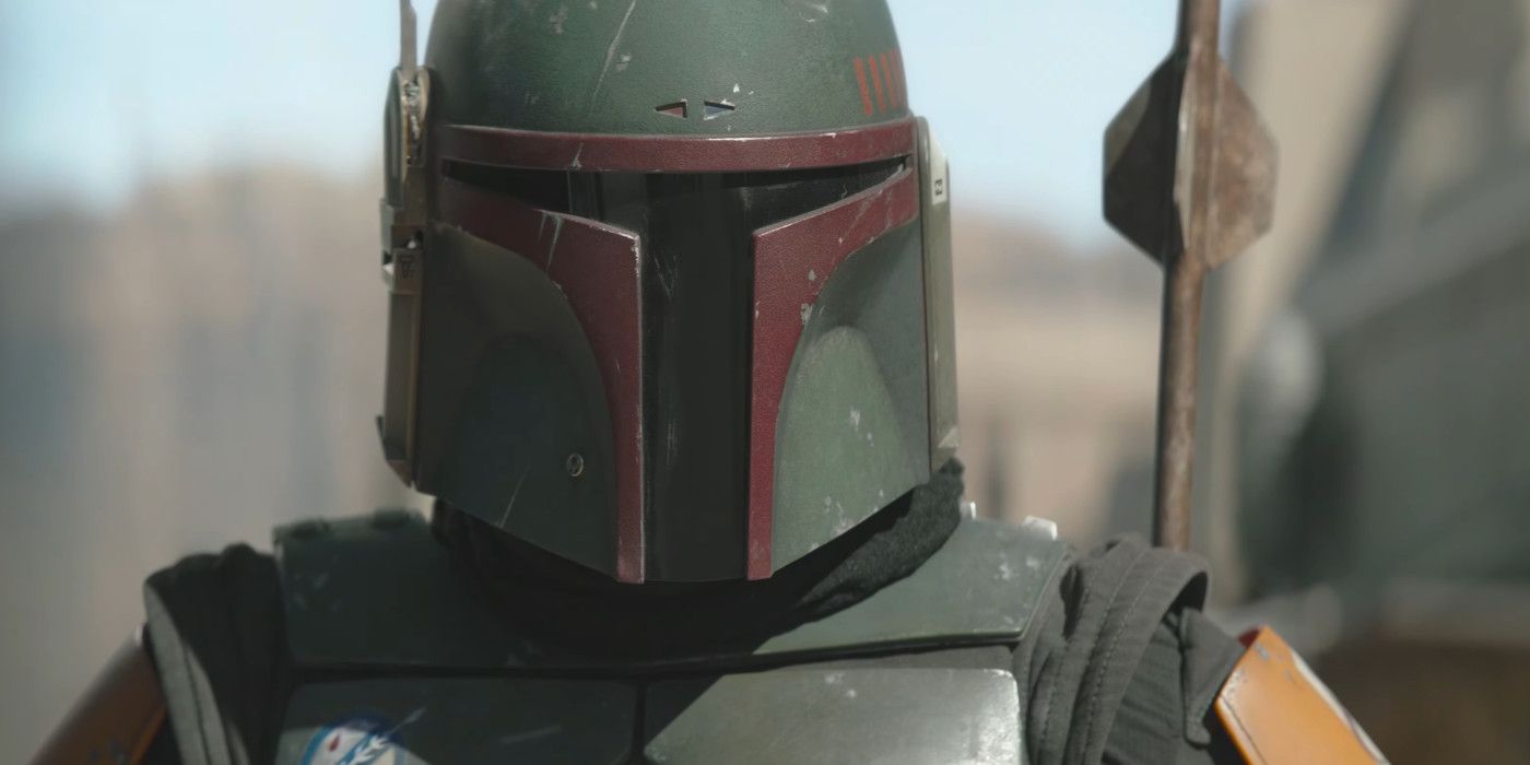 Boba Fett in The Book of Boba Fett wearing his helmet during a showdown in the street