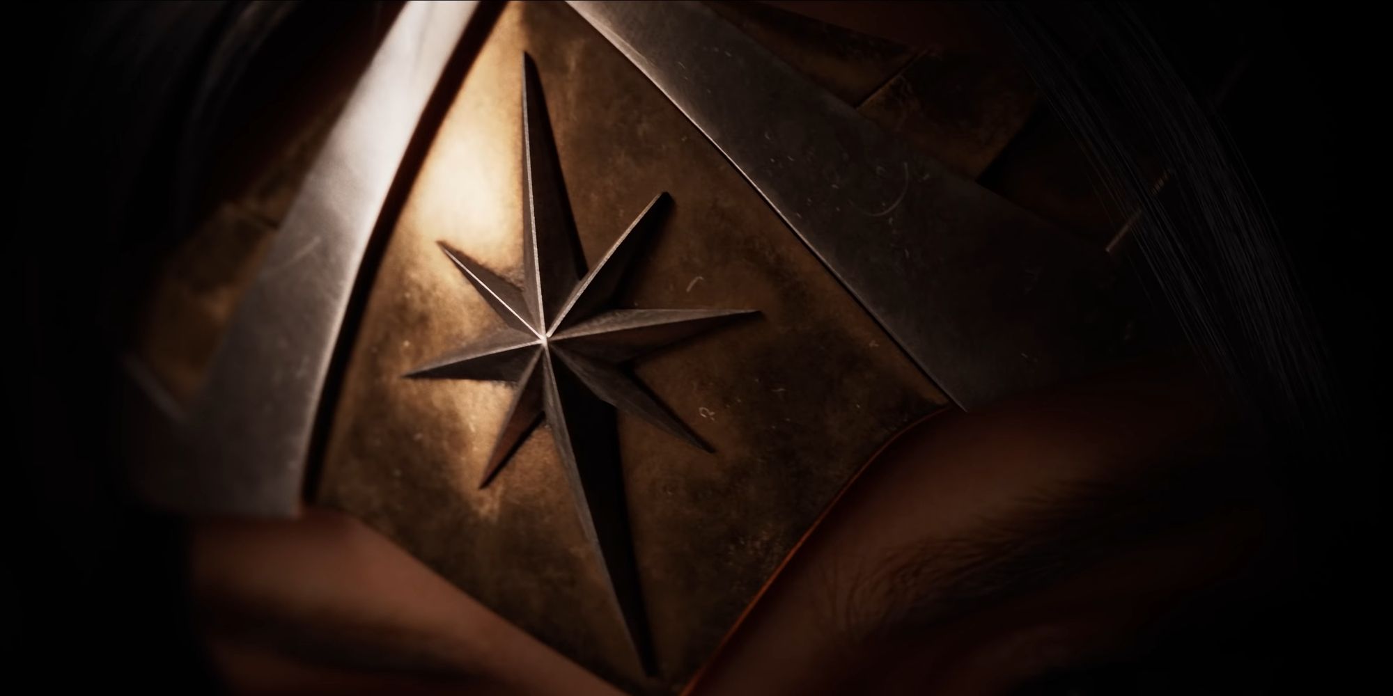 Closeup of Wonder Womans tiara in the Wonder Woman game trailer