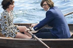 Patrizia Reggiani (Lady Gaga) in a rowboat with Maurizio Gucci (Adam Driver) in House of Gucci