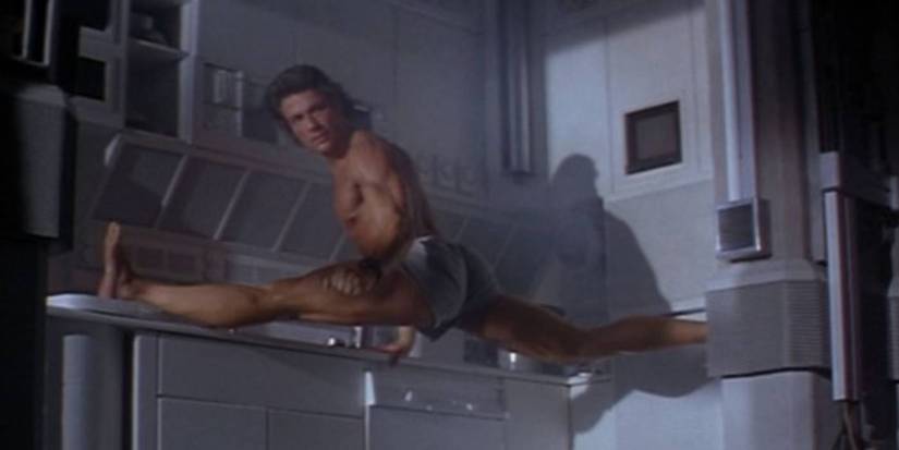 Timecop trivia: How many years after Timecop did Van Damme's splits go viral in a Volvo ad?