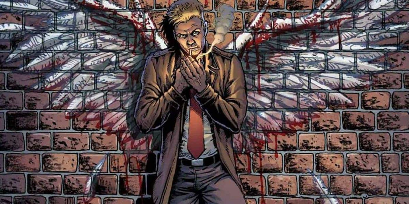 Constantine leaning against a wall with angel wings painted on it in DC Comics.