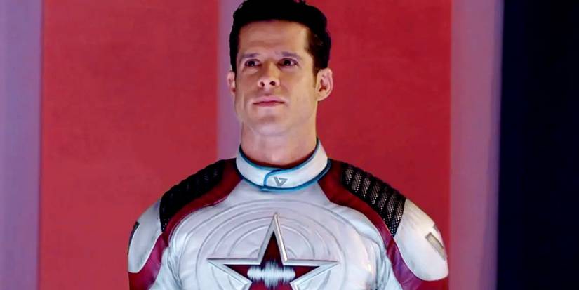 Miles Gaston Villanueva as Supersonic in front of a red background in The Boys
