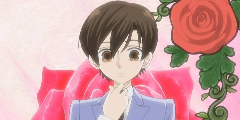 Image of Fujioka Haruhi in boy's school uniform surrounded by roses from opening theme