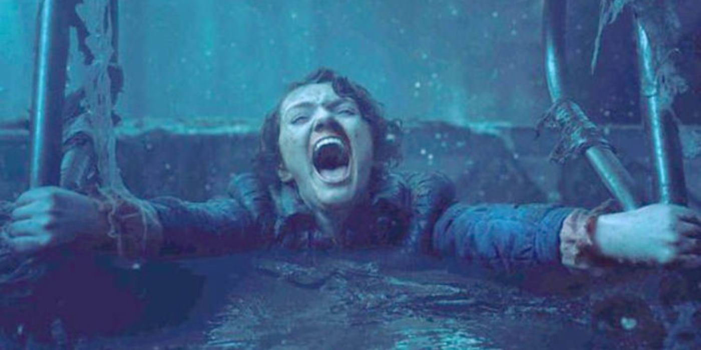 Barbara Holland screaming moments before the Demogorgon drags her down into the pool, killing her